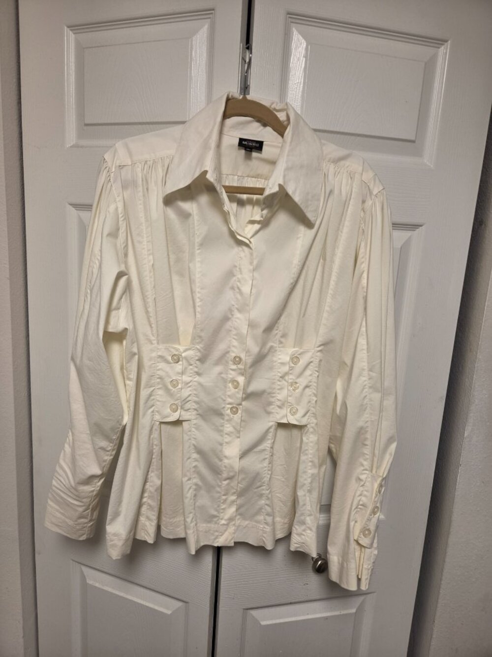 Blouse with unique details, never worn.